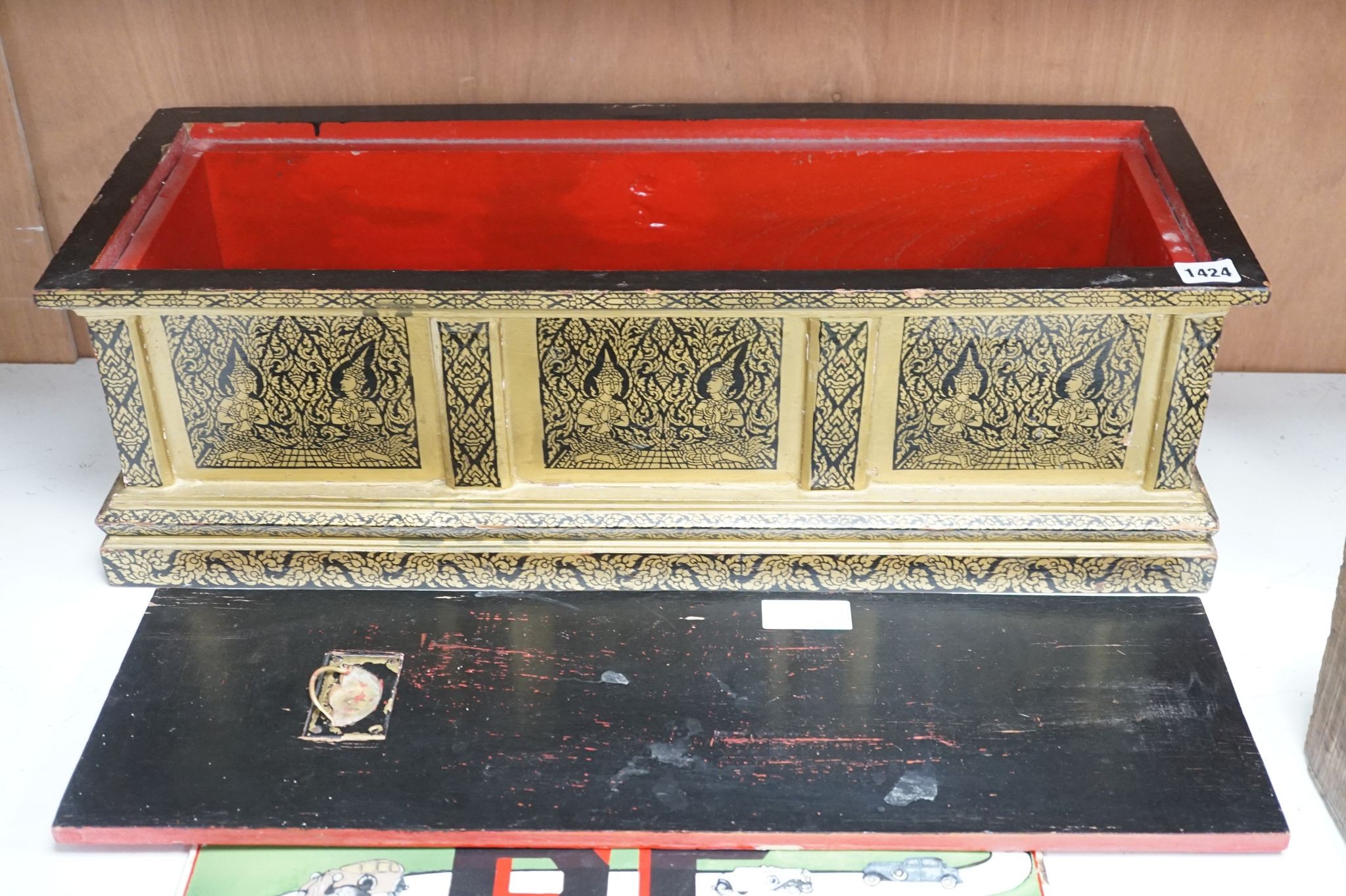 A Thai Buddhist sutra holder, 67 cms wide x 21 cms high.